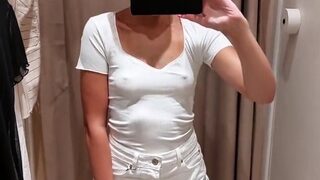 Sexy cutie takes a video of herself in the fitting room of t